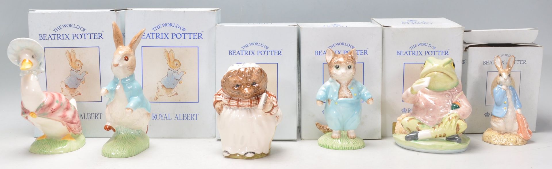 A group of six mostly large size Royal Albert ceramic figures in 'The World Of Beatrix Potter' to