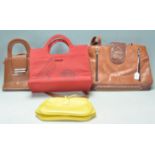 A mixed group of handbags, some designer to include Biboss Paris brown leather example, Fiorelli,