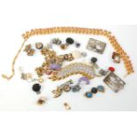 A collection of vintage 20th Century costume jewellery to include a wide selection of clip on