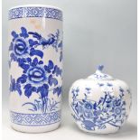 A large blue and white contemporary Chinese pumpkin shaped ginger jar decorated with peony trees etc