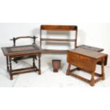 A collection of antique furniture to include a small barley oak twist table having carved floral
