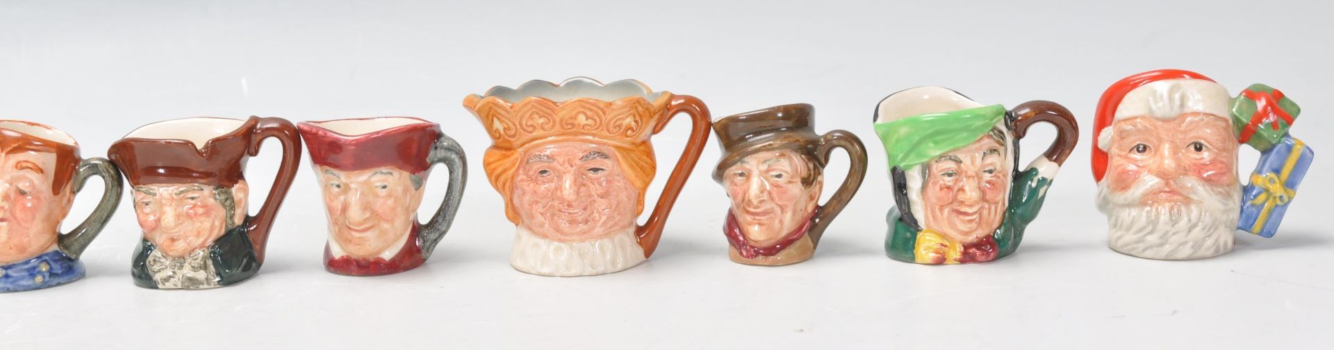 A group of ten Royal Doulton miniature Character / Toby jugs to include 2x Santa Claus D7060 and - Bild 3 aus 11