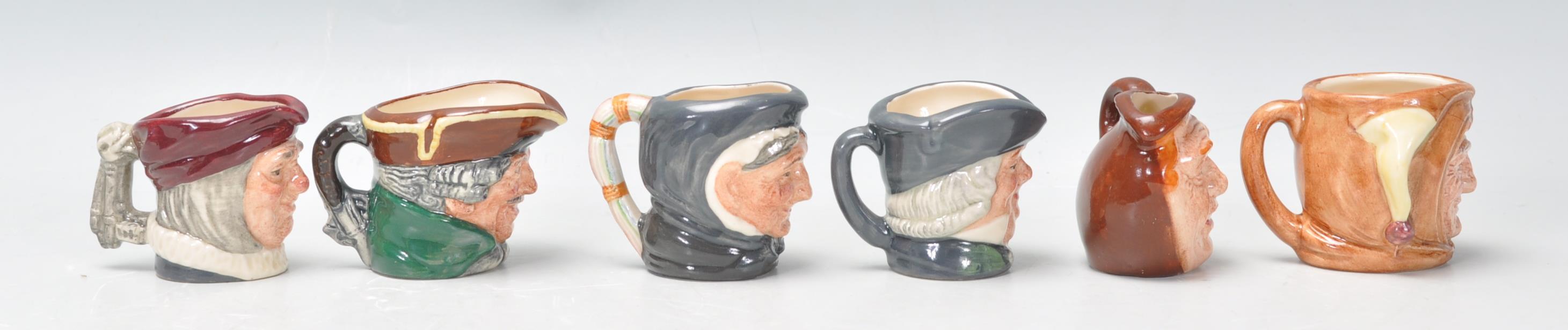 A group of Royal six Doulton miniature Character / Toby jugs to include Simon The Cellarer D6956, - Image 2 of 8