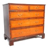 A 19th century George III mahogany inlaid chest of drawers. Raised on ogee bracket legs with 2 short