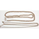 Two silver necklace chains to include a rope link example having a double hook clasp. The other