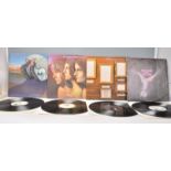 A group of four vinyl long play LP record albums by Emerson Lake & Palmer. Albums include –