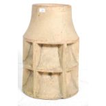 A 19th Century stoneware chimney pot of cylindrical form with pierced air vents throughout.