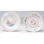 Two 19th Century Chinese famille rose plates, one having hand enamelled decoration featuring a