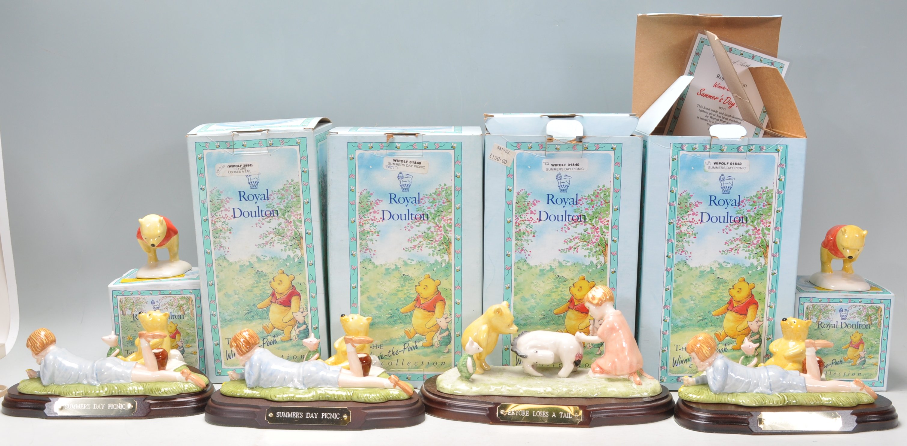 A group of six Royal Doulton ceramic figures from 'The Winnie The Pooh Collection' to include
