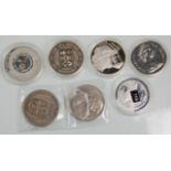 A mixed group of seven silver coins to include Isle Of Man 2000 silver proof Millennium Crown,