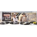 A group of four vinyl long play LP record albums by Elton John to include Tumbleweed Connection,