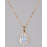 A stamped 18ct gold pendant necklace having a pendant set with an opal within a halo of round cut