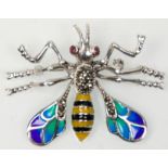 A stamped 925 silver bug brooch in the form of a wasp having plique a jour enamelled wings set