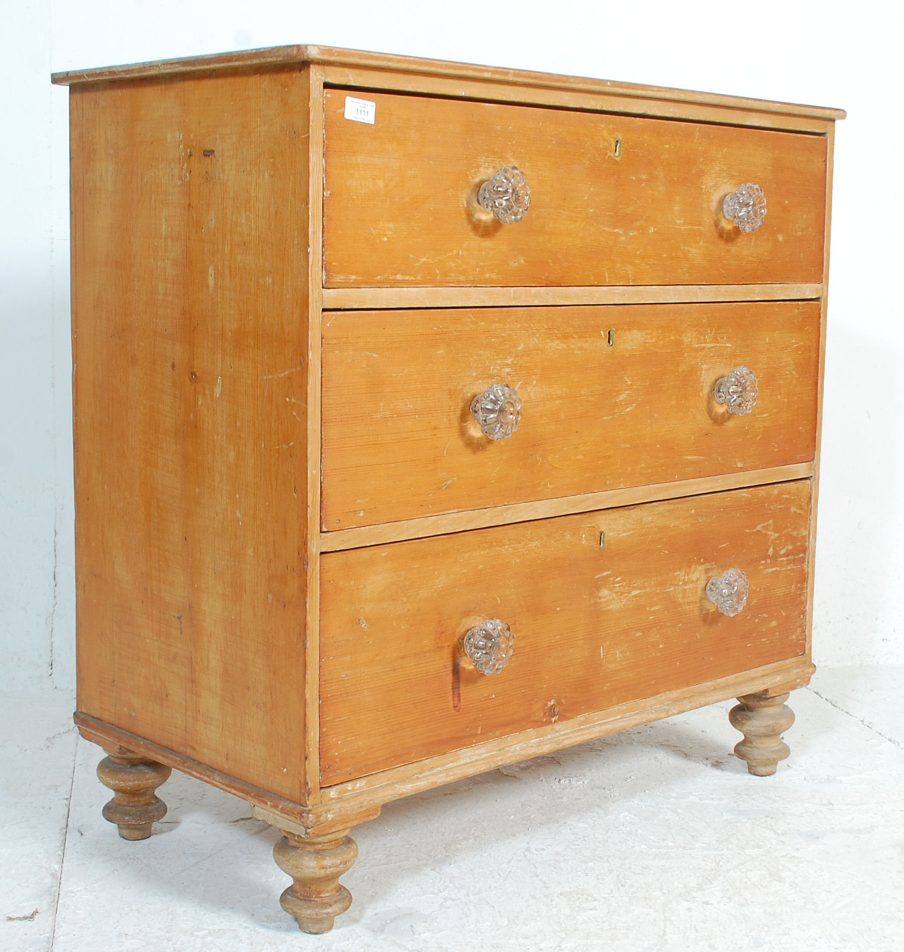 A Victorian pine cottage small chest of drawers being raised on bun feet with glass handles to the 3 - Image 2 of 7