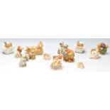 A collection of Harmony Kingdom resin novelty figurines to include a bull dog box, field mouse
