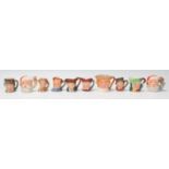 A group of ten Royal Doulton miniature Character / Toby jugs to include 2x Santa Claus D7060 and