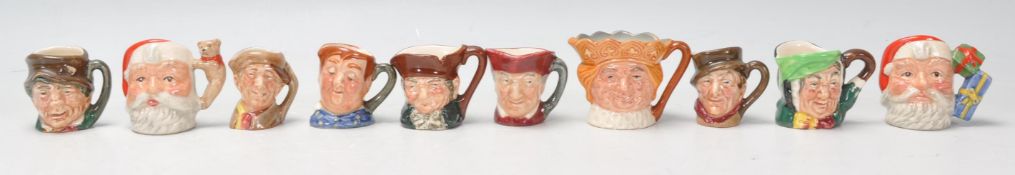 A group of ten Royal Doulton miniature Character / Toby jugs to include 2x Santa Claus D7060 and