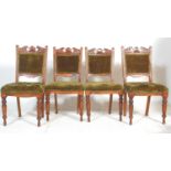 A group of four late 19th century mahogan Art Nouveau mahogany dining chairs having solid frames