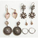 A group of five pairs of silver ladies earrings to include a pair flower head earrings set with