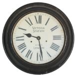 A 20th Century reproduction Victoria Station, railway London wall clock having a white face with