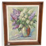 A 20th Century original oil on canvas still life painting depicting a vase of flowers set within a