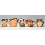 A group of five Royal Doulton character jugs to include The Trapper D6609, Monty D6202, Paddy, and