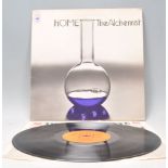 A vinyl long play LP record album by Home– The Alchemist – Original CBS 1st U.K. Press – S 65550