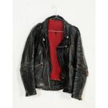A vintage retro 1980's gentleman's leather biker jacket, having a double buck fasting to the base of