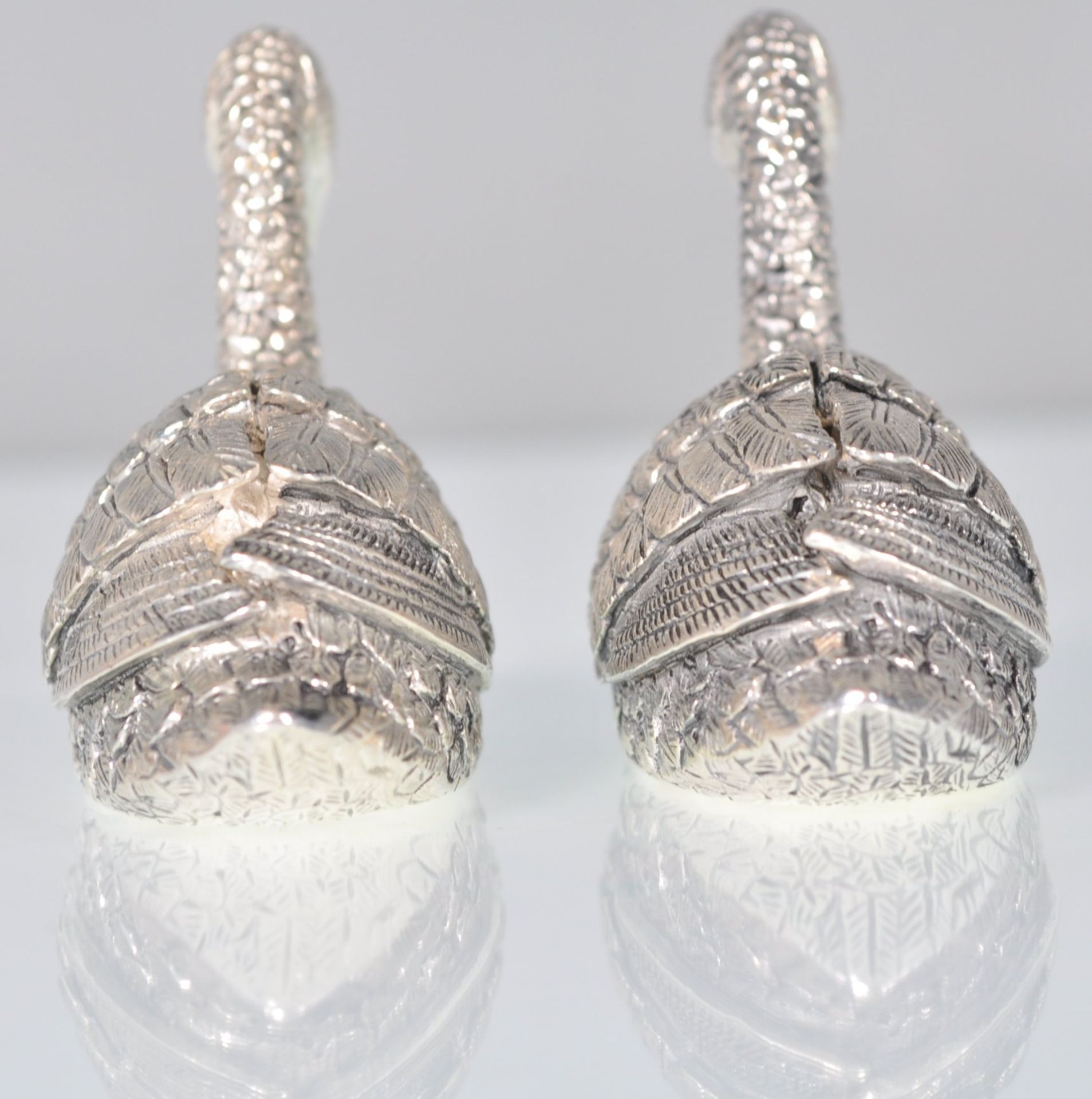A pair of stamped 925 silver condiments in the form of swans having raised details and set with - Image 4 of 6