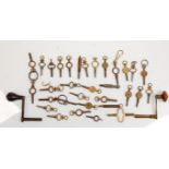 A group of thirty antique and vintage watch keys together with three clock keys.