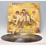 A vinyl long play LP record album by Hollies – Hollies Sing Hollies – Original black and yellow