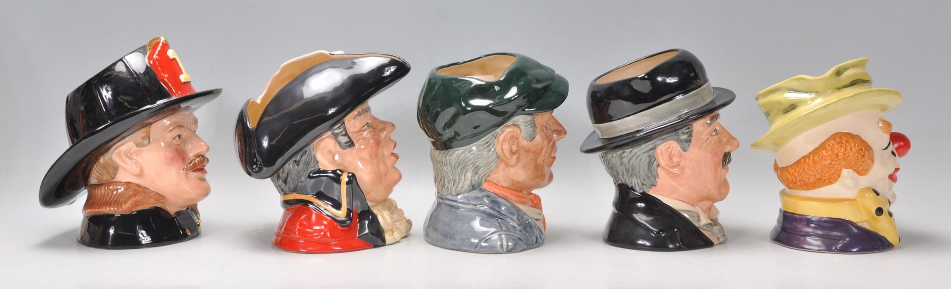A group of five Royal Doulton character jugs to include The Fireman D6697, Town Crier D6895, - Bild 2 aus 10