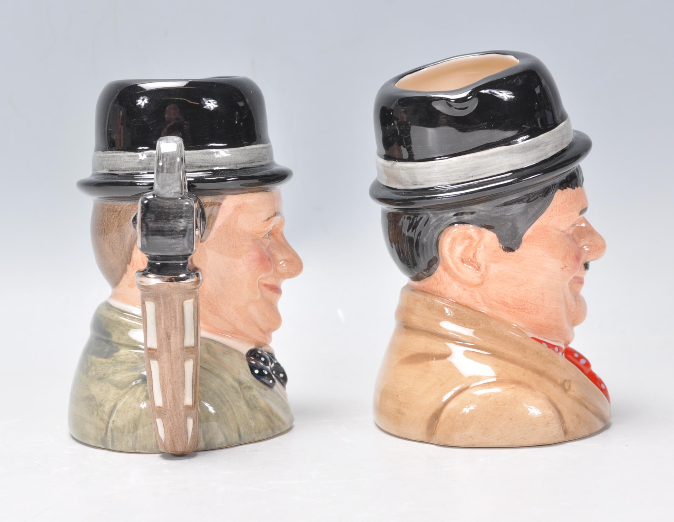 Laurel & Hardy - Two Royal Doulton ceramic Character / Toby jugs one of Stan Laurel D7008 and Oliver - Image 2 of 6