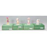 Top Cat - A group of four Beswick ceramic Top Cat figures to include Top Cat, Choo Choo, Benny and