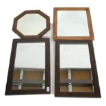 A group of four vintage 20th Century wooden framed wall mirrors to include an octagonal mirror