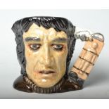 A Royal Doulton character jug in the form of Frankenstein's Monster. Number D7052, limited edition