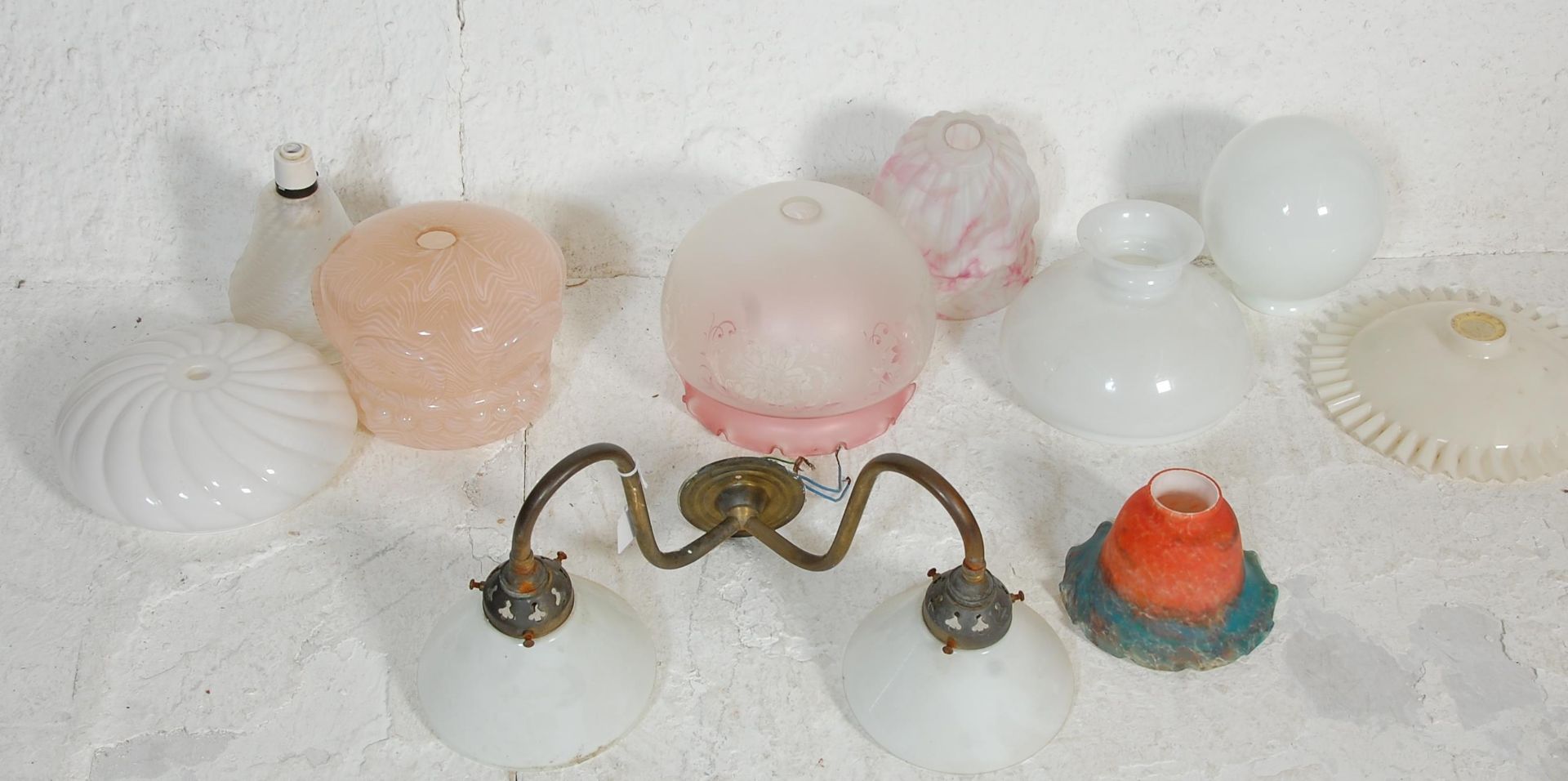 A good group of vintage glass shades dating from the early 20th Century to include Art Deco examples