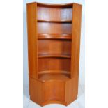 A vintage retro G Plan mid 20th Century teak wood curved corner wall unit book / display shelf