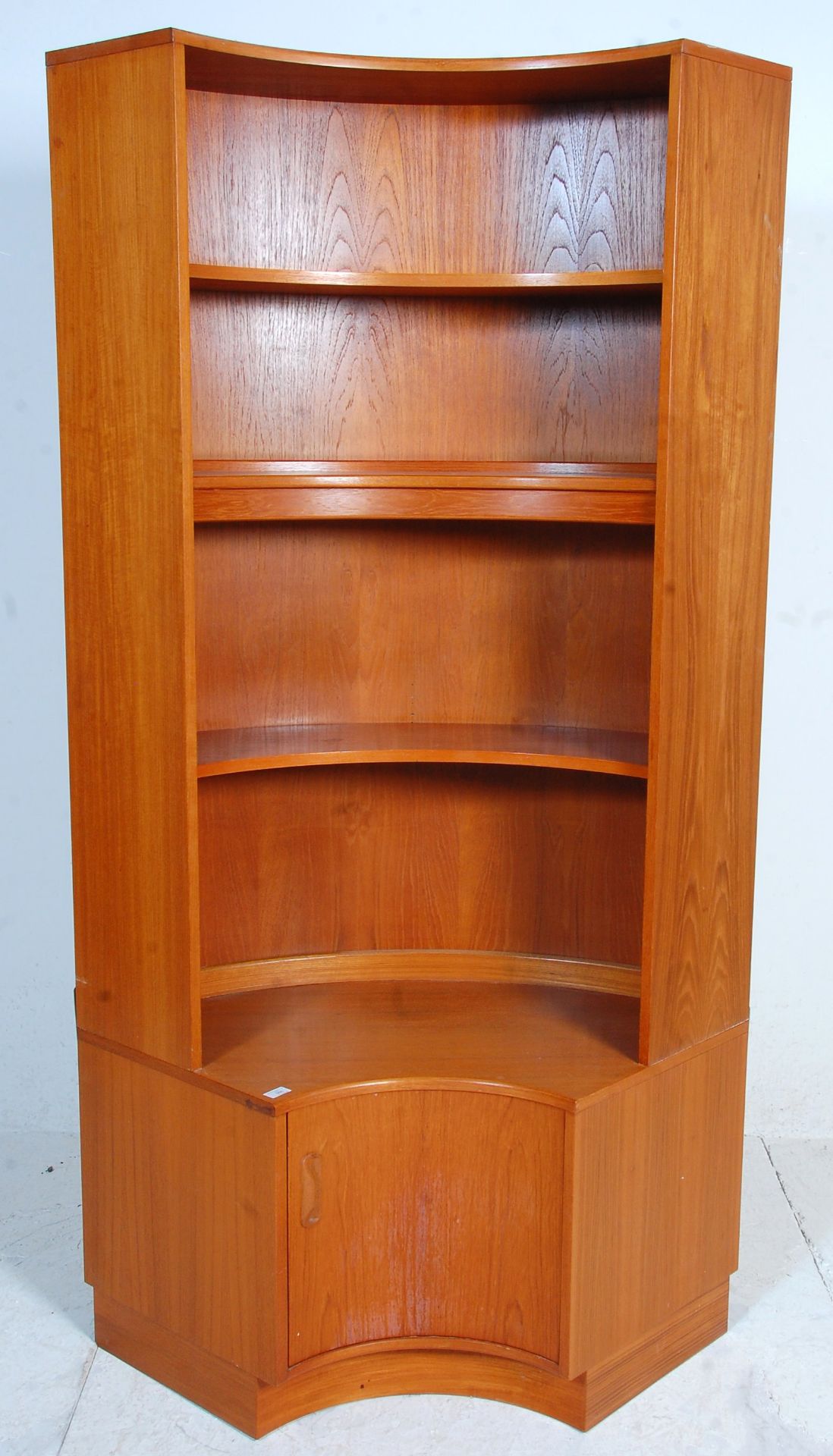 A vintage retro G Plan mid 20th Century teak wood curved corner wall unit book / display shelf