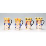 A group of four Royal Doulton limited edition King and Queen character jugs to include King and