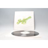 A vinyl long play LP record album by Curved Air – Phantasmagoria – Original Warner Bros Records  U.