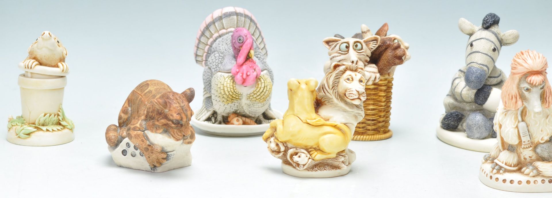 A group of sixteen resin Harmony Kingdom resin figurines to include red panda's, kitten in a - Bild 2 aus 13