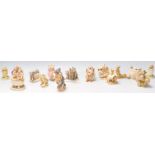 A group of fourteen Harmony Kingdom resin animal novelty figurines to include dragons, a kangaroo