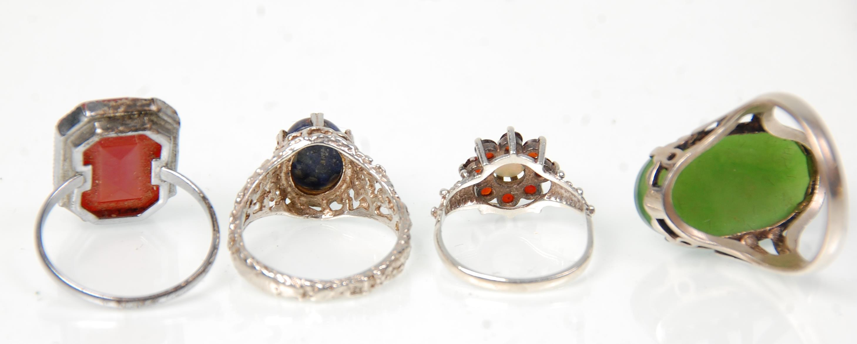 A group of seven silver rings to include a green stone panel ring (possibly jade) a lapis lazuli set - Image 5 of 6