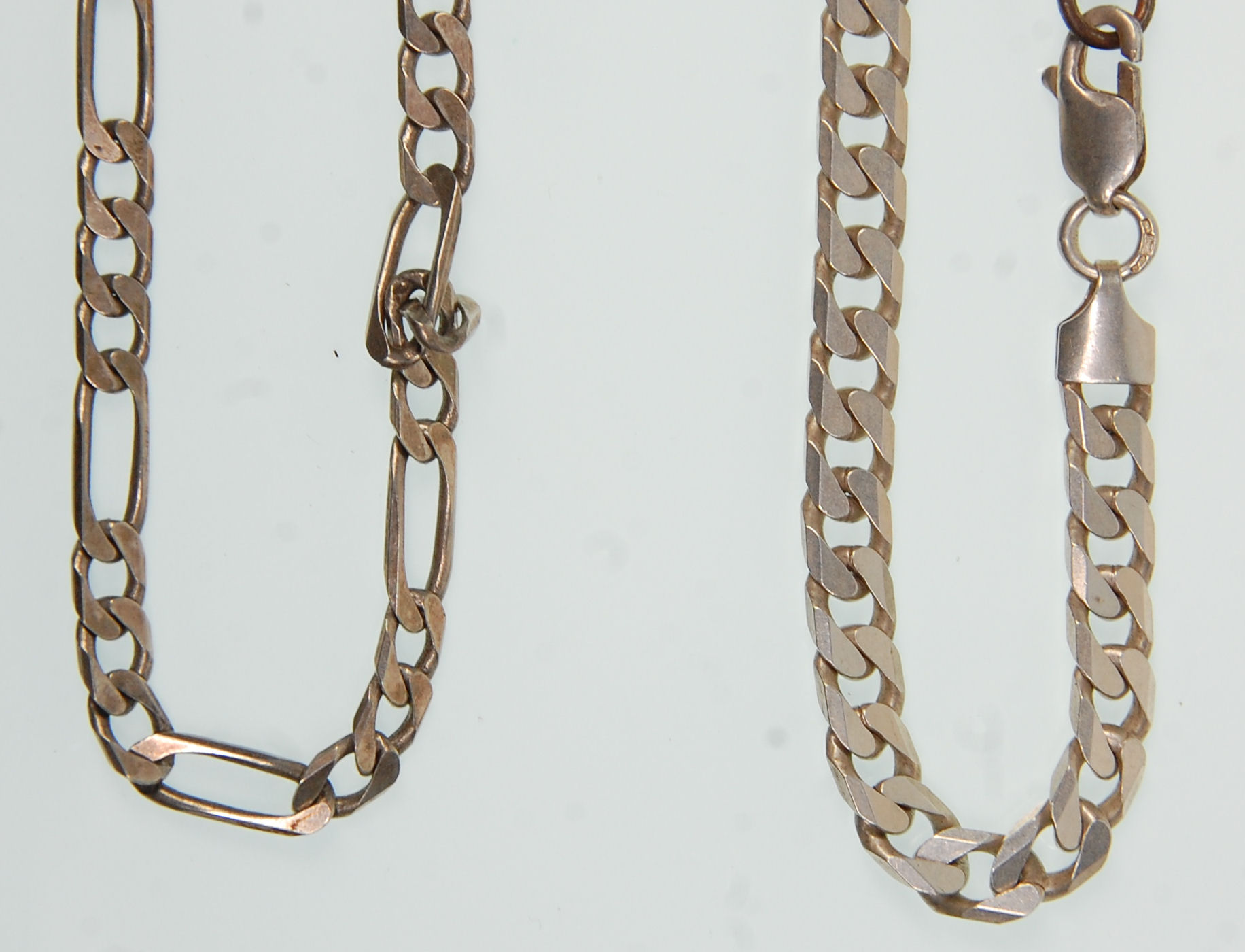 Two silver flat link necklace chains, one being a Figaro example with both having a lobster clasp. - Image 2 of 4