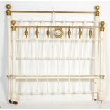 A 19th Century Victorian brass double bed frame having ball finials on tubular supports, each