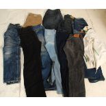 A good collection of gentlemen's designer jeans to include designers Paul Smith, Calvin Klein, Levi,
