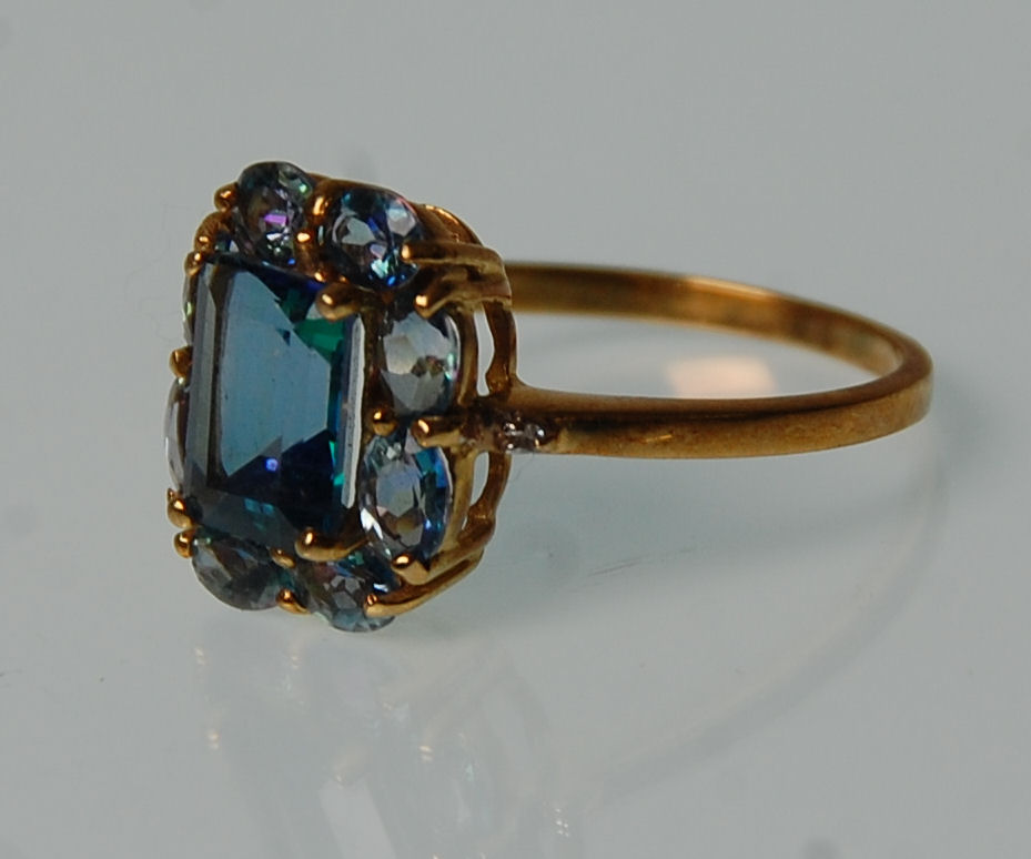 Two 9ct yellow ladies dress rings. One set with a large square faceted cut blue stone surround by - Image 12 of 12