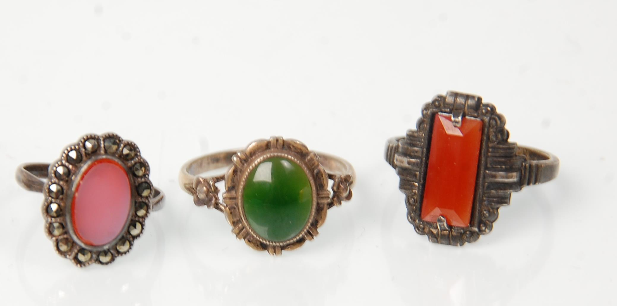 A group of seven silver rings to include a green stone panel ring (possibly jade) a lapis lazuli set - Image 4 of 6