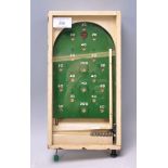 A lovely small vintage 20th Century advertising Chad Valley wooden cased pinball machine, having